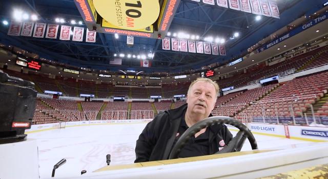Joe Louis Arena building manager Al Sobotka swings the first